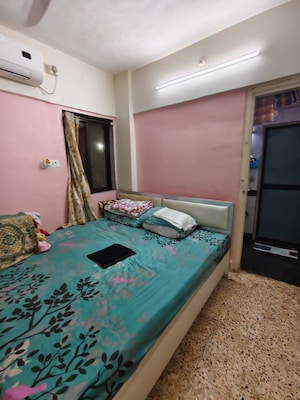 Bedroom in 2 BHK Apartment at Ani Anu Sri Balaji Enclave, Malad West – for Sale