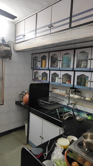 Kitchen in 1 BHK Apartment at Asawari Lokpuram, Vasant Vihar – for Sale