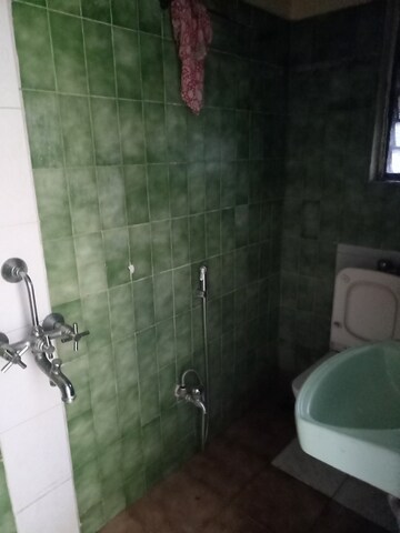 Attached Bathroom in 2.5 BHK Apartment at Siddhartha Darshan CHS, Naupada – for Rent