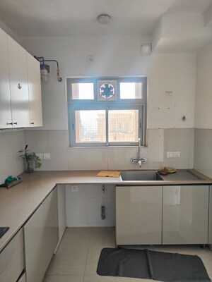 Kitchen in 2 BHK Apartment at Hiranandani Estate Rodas Enclave, Ghodbunder Road – for Sale