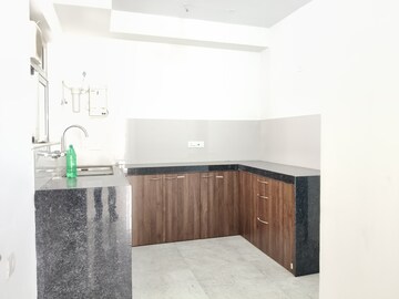 Kitchen in 4 BHK Apartment at Hiranandani Estate Rodas Enclave, Ghodbunder Road – for Sale