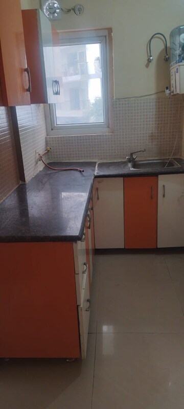 Kitchen in 1 RK Apartment at Antriksh Golf View, Sector 78 – for Rent