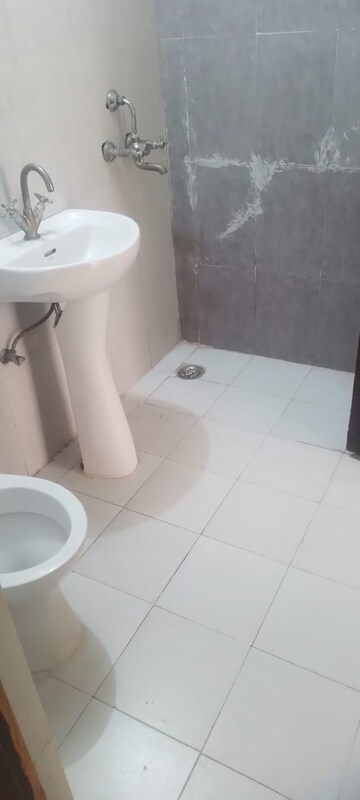 Bathroom in 1 RK Apartment at Antriksh Golf View, Sector 78 – for Rent