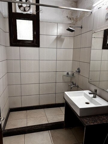 Bathroom in 3 BHK Builder Floor at Apex Apartments, Sector 45 – for Rent