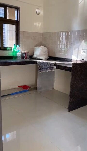Kitchen in 1.5 BHK Apartment at Dosti Planet North, Shilphata – for Rent