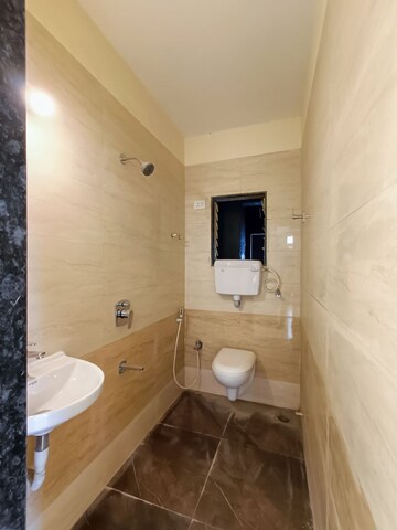 Bathroom in 1 BHK Apartment at Precious Empire, Pale Gaon – for Sale