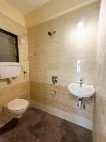 Bathroom in 1 BHK Apartment at Precious Empire, Pale Gaon – for Sale
