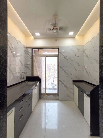 Kitchen in 1 BHK Apartment at Precious Empire, Pale Gaon – for Sale
