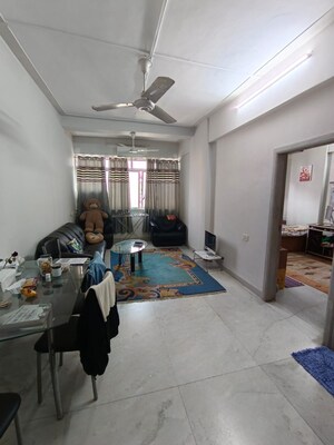 Living Room in 1 BHK Apartment at Colaba – for Sale