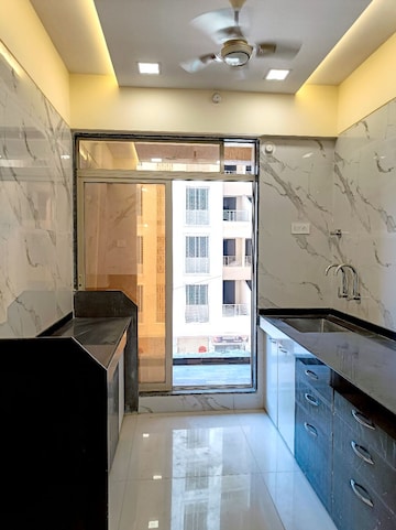 Kitchen in 2 BHK Apartment at Precious Empire, Pale Gaon – for Sale