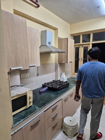 Kitchen in 2 BHK Apartment at RAS Palm Residency, Sector 76 – for Rent