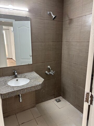 Bathroom in 3 BHK Apartment at The 3C Lotus Panache, Sector 110 – for Rent