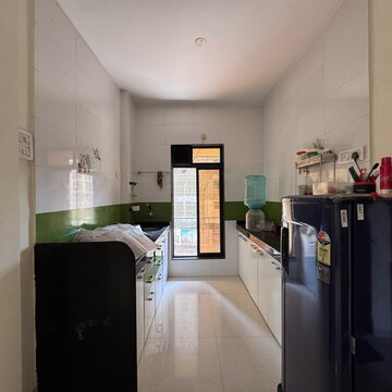 Kitchen in 2 BHK Apartment at Agarwal And Doshi Complex, Vasai West – for Sale