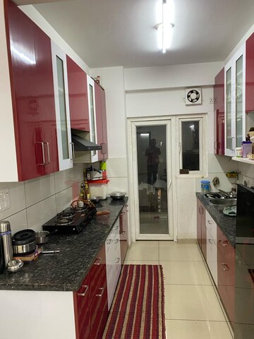 Kitchen in 2.5 BHK Apartment at Gulshan Botnia, Sector 144 – for Sale