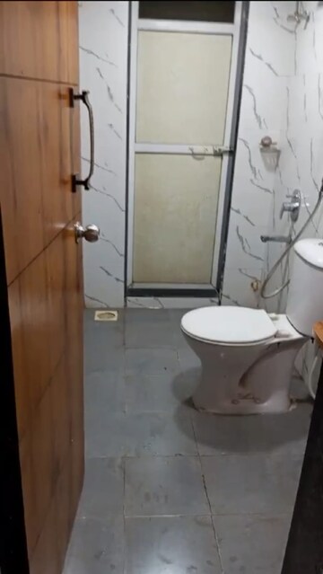 Bathroom in 2 BHK Apartment at Sunrise Glory, Shilphata – for Sale