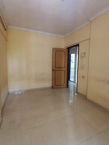 Room in 2 BHK Apartment at Kharigaon – for Sale