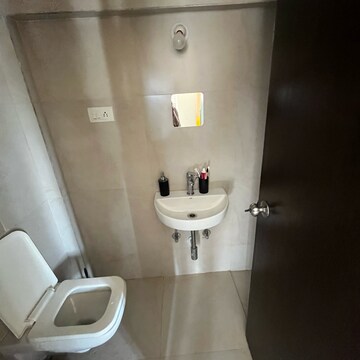 Bathroom in 1 BHK Apartment at Conwood Astoria, Umershetpada – for Rent