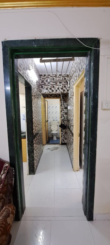 Building Lobby in 2 BHK Apartment at Mittal Tower CHS, Kopar Khairane – for Rent