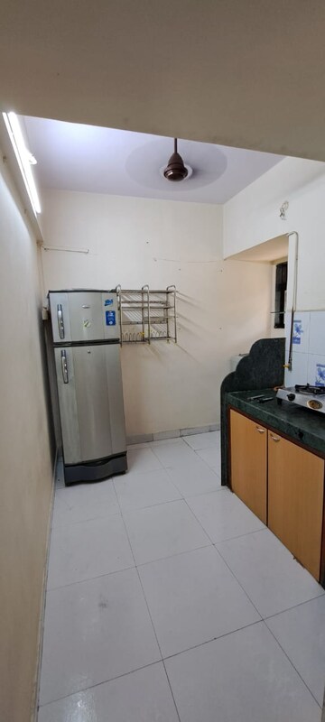 Kitchen in 2 BHK Apartment at Mittal Tower CHS, Kopar Khairane – for Rent