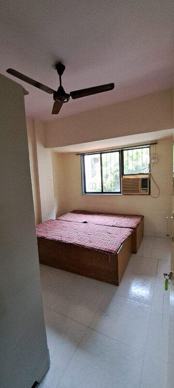 Bedroom in 2 BHK Apartment at Mittal Tower CHS, Kopar Khairane – for Rent