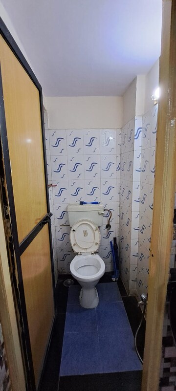 Bathroom in 2 BHK Apartment at Mittal Tower CHS, Kopar Khairane – for Rent