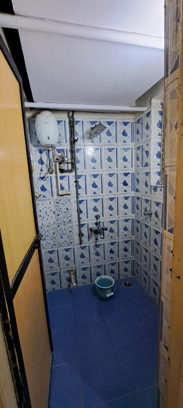 Bathroom in 2 BHK Apartment at Mittal Tower CHS, Kopar Khairane – for Rent