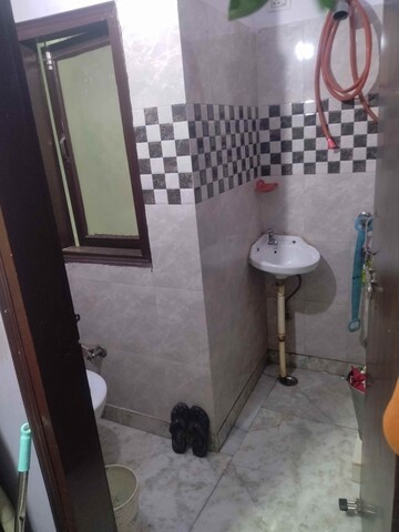 Bathroom in 1.5 BHK Builder Floor at Govindpuri – for Sale