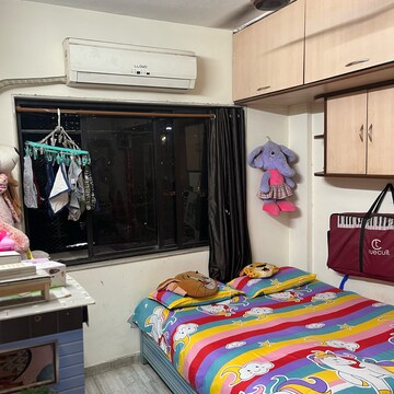 Bedroom in 2 BHK Apartment at Sankalp II, Riddhi Gardens – for Rent