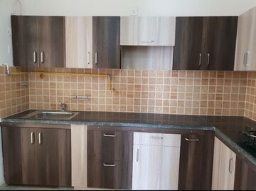 Kitchen in 4 BHK Apartment at Spring Meadows, Tech Zone 4 Greater Noida – for Sale