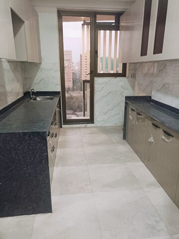 Kitchen in 3 BHK Apartment at Andheri CHS, Andheri West – for Rent
