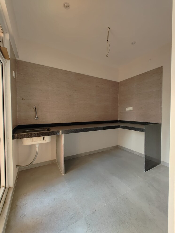 Kitchen, om-residency-ulwe 1 Bedroom 635 Sq.Ft. Apartment In Ulwe Sector 5 Navi Mumbai 8540335