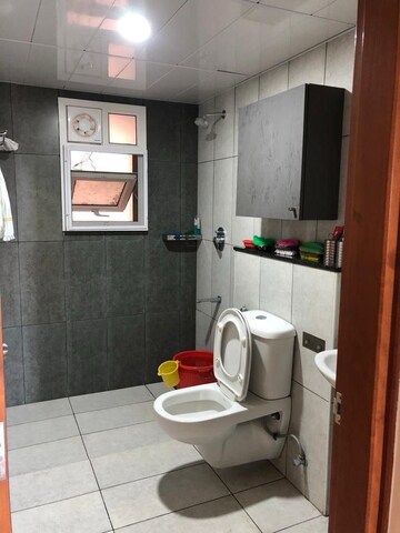 Bathroom in 3 BHK Apartment at Prestige Song Of The South, Yelenahalli – for Rent