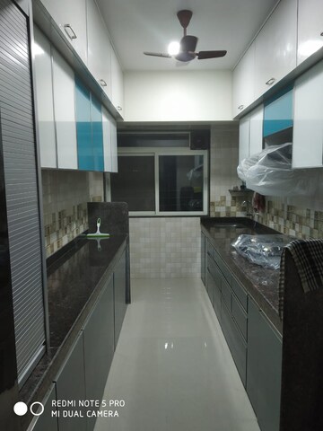 Kitchen in 2 BHK Apartment at Goregaon West View CHS, Goregaon West – for Rent
