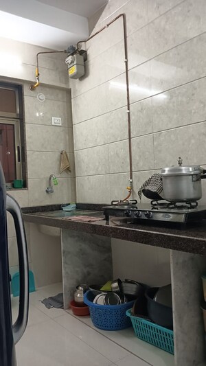 Kitchen in 2 BHK Apartment at MS Shila Bina CHS, Borivali West – for Sale