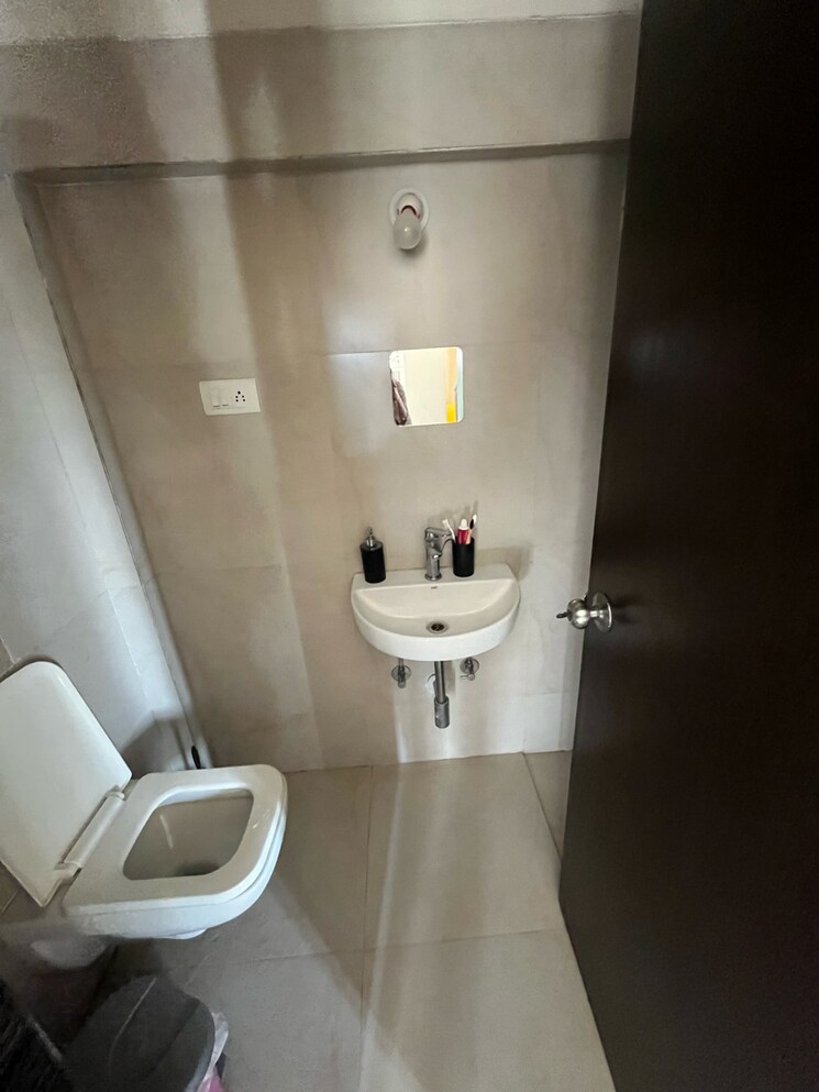 Bathroom, conwood-astoria 1 Bedroom 507 Sq.Ft. Apartment In Umershetpada Mumbai 8657547