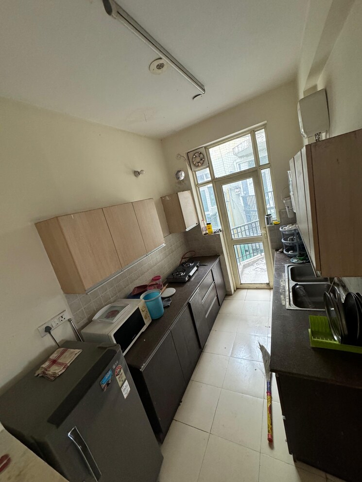 Kitchen, sushma-green-vista 2 Bedroom 1050 Sq.Ft. Apartment In Ghazipur Zirakpur 8657530