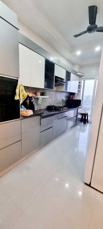 Kitchen in 4 BHK Builder Floor at Ansal API Esencia, Sector 67 – for Rent
