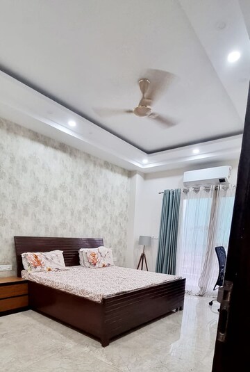 Bedroom in 4 BHK Builder Floor at Ansal API Esencia, Sector 67 – for Rent