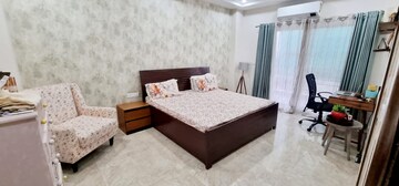 Bedroom in 4 BHK Builder Floor at Ansal API Esencia, Sector 67 – for Rent