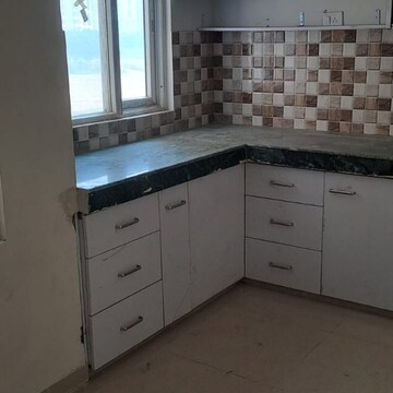 Kitchen in 2 BHK Apartment at Shree Vardhman Green Court, Sector 90 – for Rent