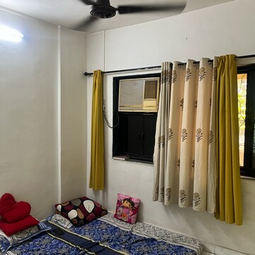 Bedroom in 1 BHK Apartment at Sai Minar CHS, Gokuldham Colony – for Rent