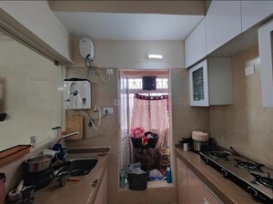 Kitchen in 2 BHK Apartment at Dosti West County, Balkum Pada – for Sale