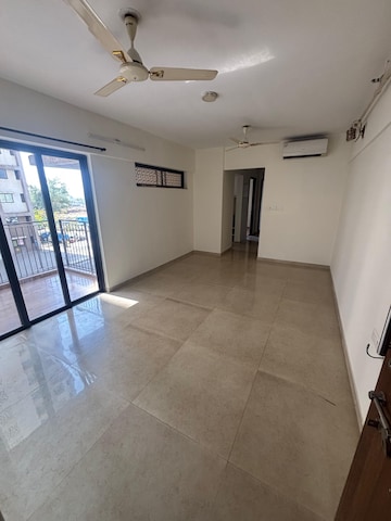 Living Room in 2 BHK Apartment at Lodha Lakeshore Greens, Dombivli East – for Rent