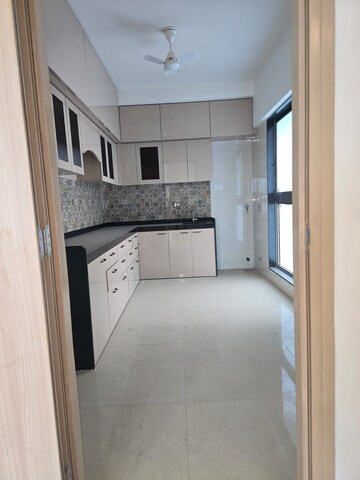 Kitchen in 4 BHK Apartment at Rajesh Raj Infinia, Malad West – for Rent