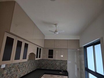 Kitchen in 4 BHK Apartment at Rajesh Raj Infinia, Malad West – for Rent