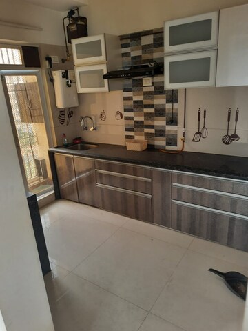 Kitchen in 2 BHK Apartment at Anjani Sparsh, Mira Road – for Sale