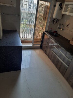 Kitchen in 2 BHK Apartment at Anjani Sparsh, Mira Road – for Sale