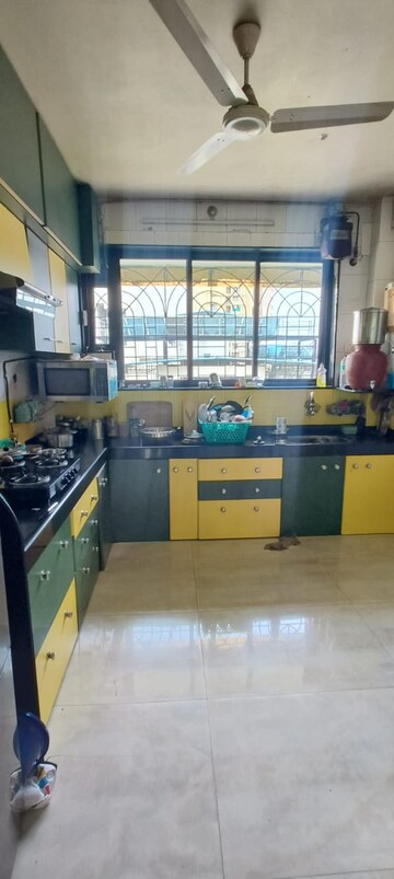 Kitchen in 3 BHK Apartment at Naupada – for Sale