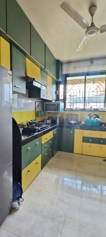 Kitchen in 3 BHK Apartment at Naupada – for Sale