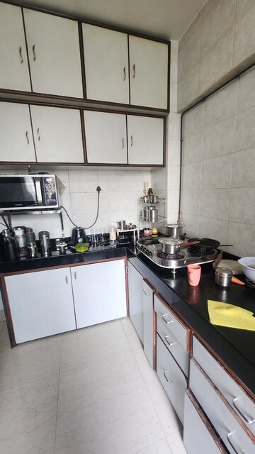 Kitchen in 2 BHK Apartment at Kshitij Building, Chembur – for Rent